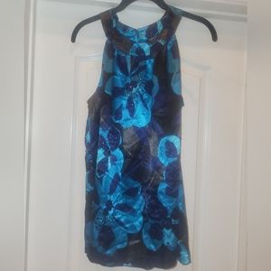 Beautiful top with sequin embellishments. satin feel.